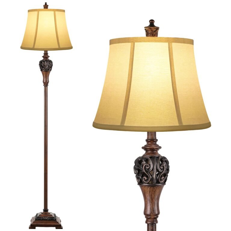 Floor lamp with ornate dark brown base and beige shade