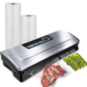 Vacuum sealer with rolls of plastic, steak, and asparagus
