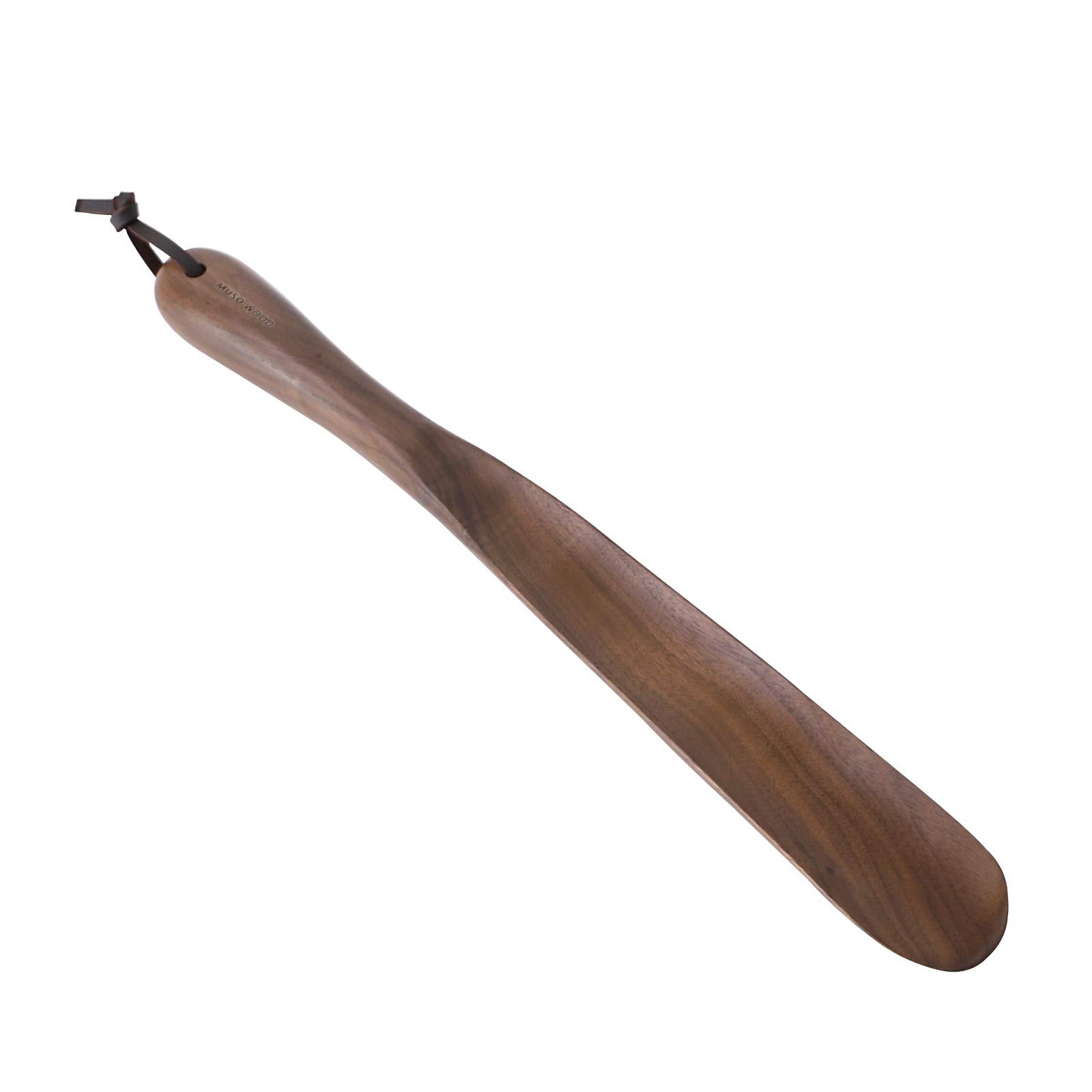 Wooden shoe horn with a leather loop, isolated on white background