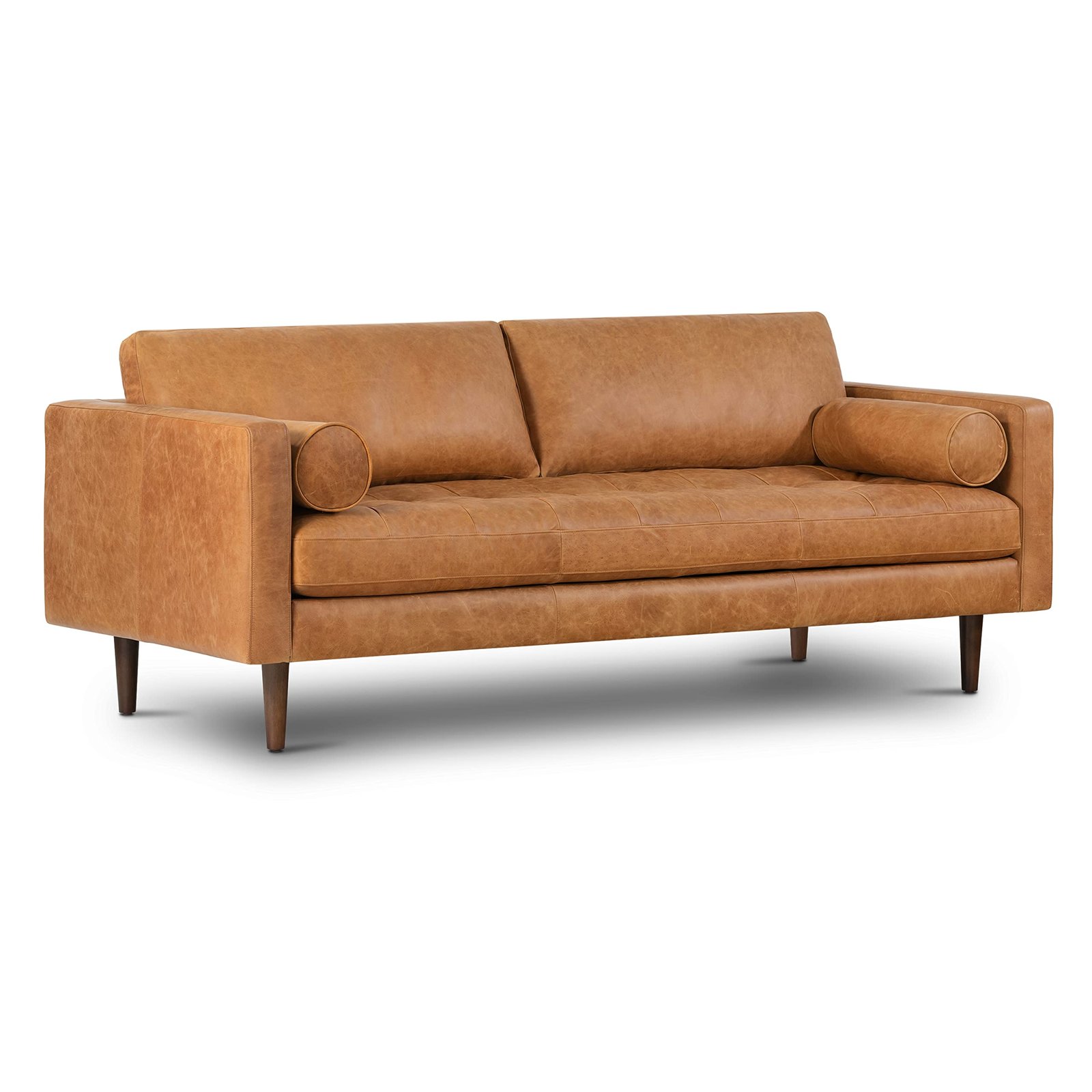 Brown leather mid-century modern sofa with bolster pillows and wooden legs