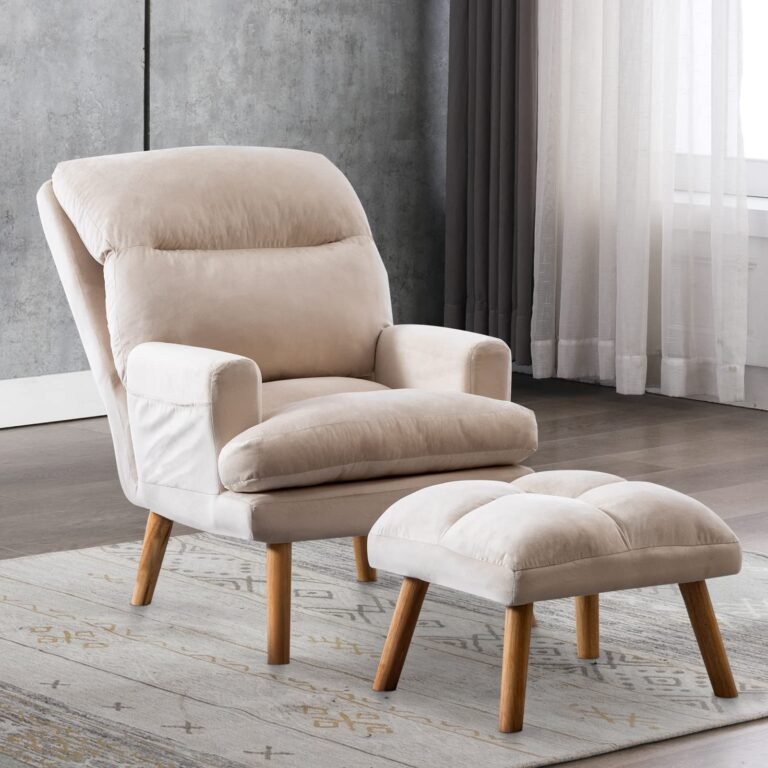 Beige armchair and ottoman with wooden legs on a patterned rug