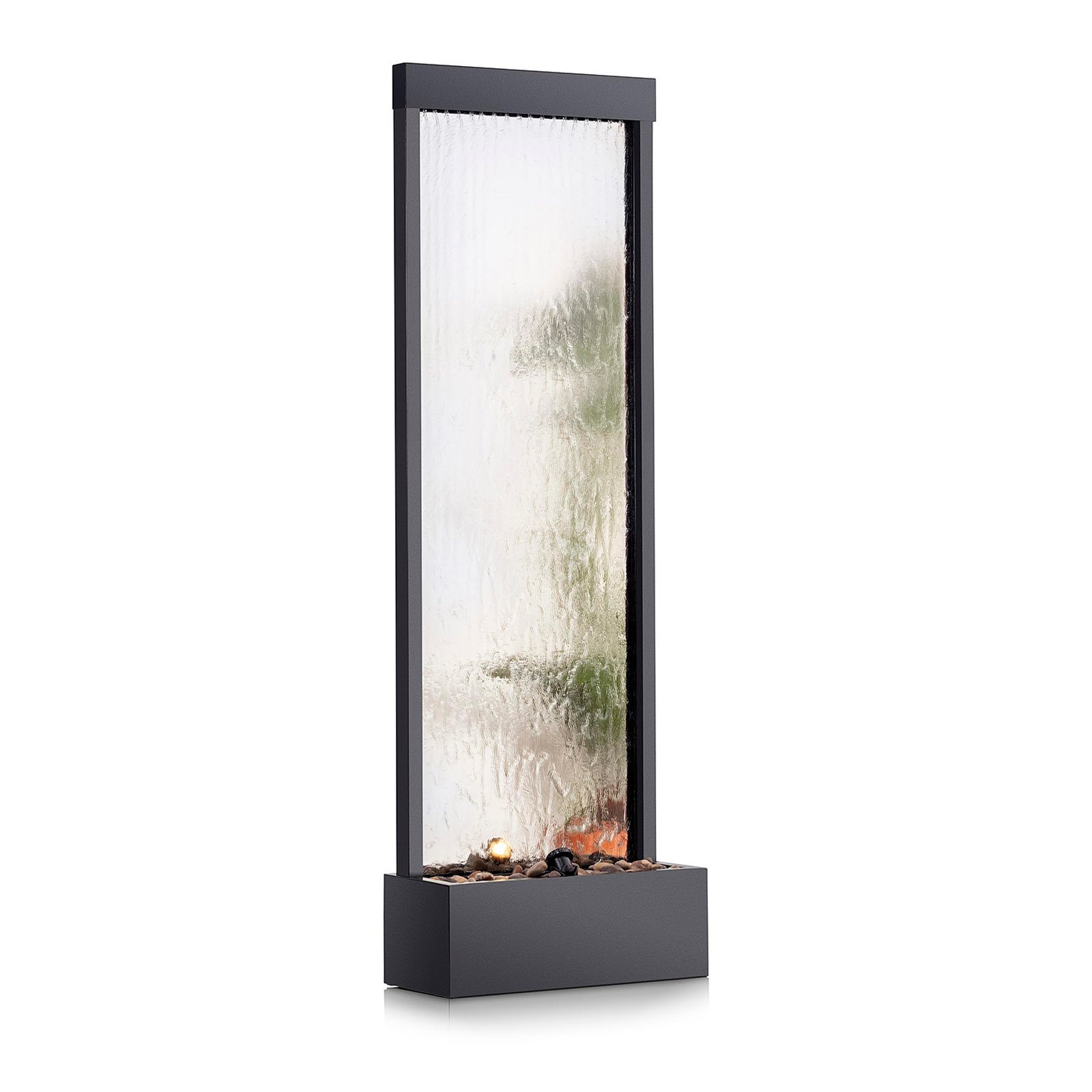 Indoor water fountain with a glass panel and rocks