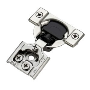 A metal cabinet hinge with screws, black plastic, and a 1/2 marking