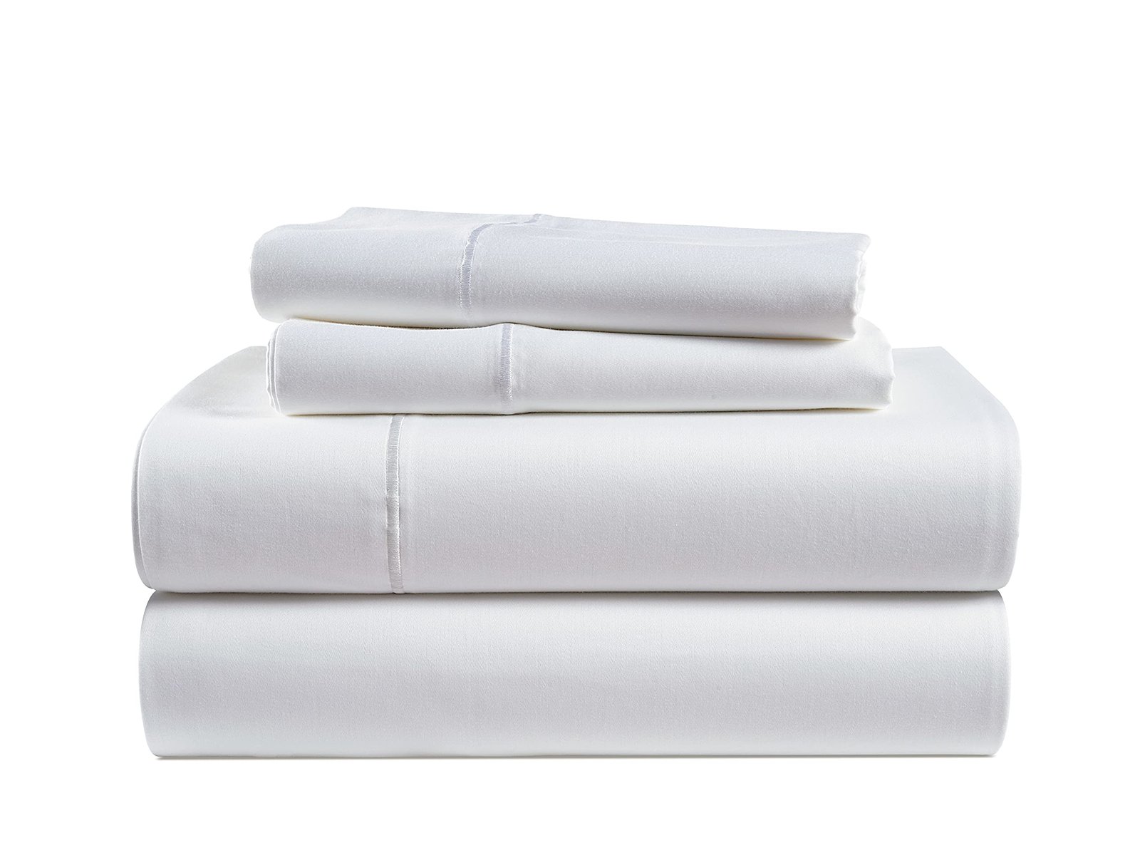 Stack of folded white bed sheets with decorative stitching