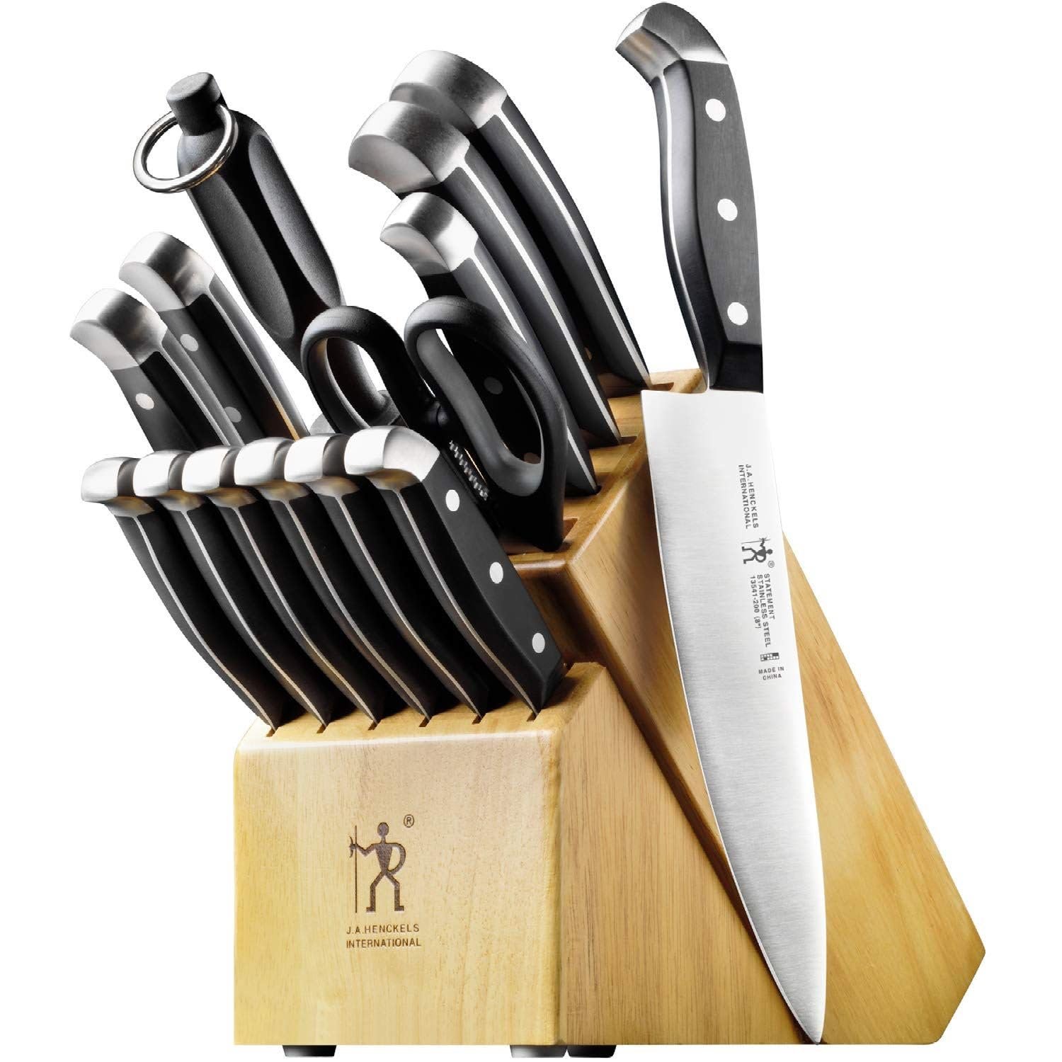Knife set with black handles and silver accents in a wooden block