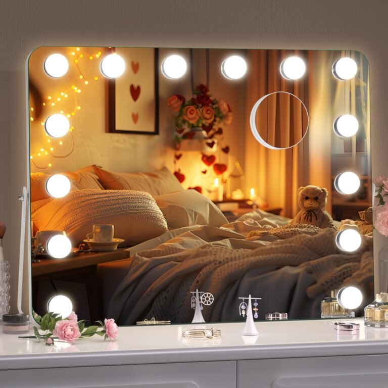 Vanity mirror with lights reflecting a cozy bedroom scene