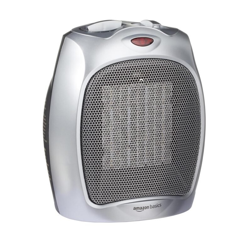Silver Amazon Basics space heater with a mesh front and red display