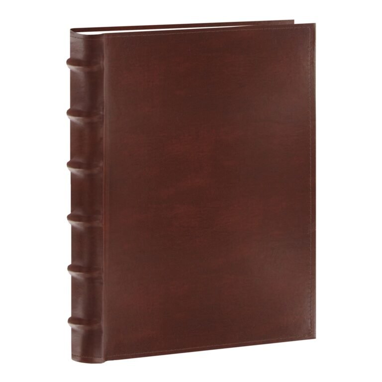 Brown leather-bound book with raised spine detailing, isolated on white background
