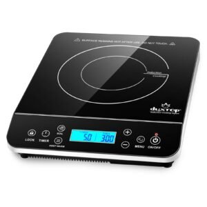 Black induction cooktop with digital display, control buttons, and warning label