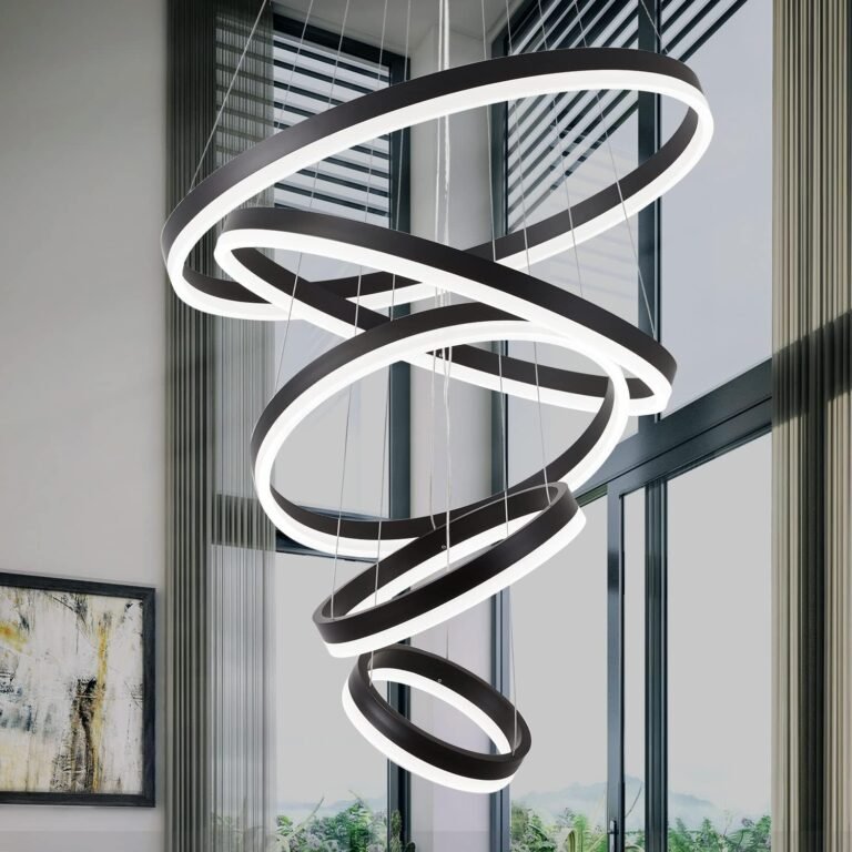 Modern black and white spiral chandelier hanging in a bright room