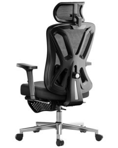 Black ergonomic office chair with mesh back and headrest, on wheels