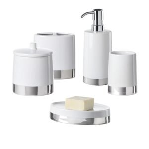 White and silver bathroom accessories set, including soap and dispenser