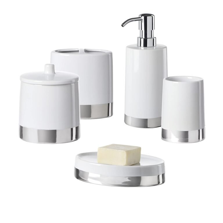 White and silver bathroom accessories set, including soap and dispenser