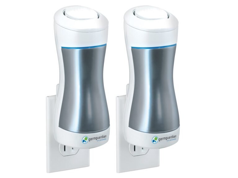 Two GermGuardian UV-C air sanitizers plugged into wall outlets