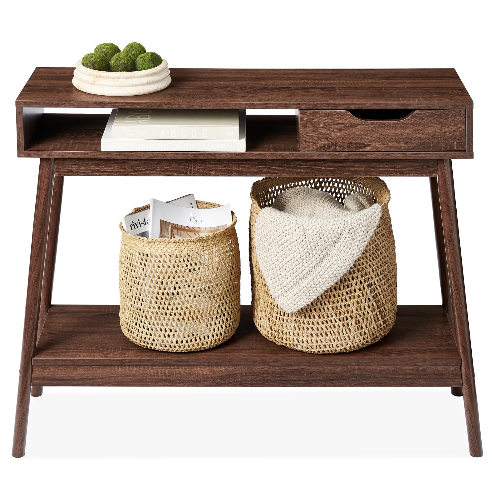 Wooden console table with baskets, books, and decorative moss balls