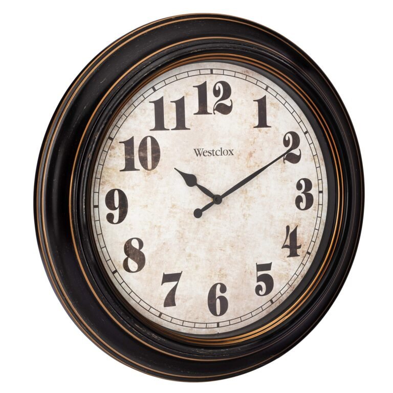 Black and gold Westclox wall clock with a vintage-style face